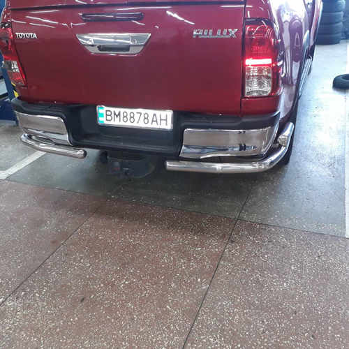 Захист заднього бампера під фаркоп для Hilux 2015+